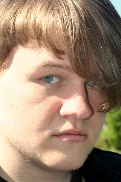 грустный молодой человек - Фото, изображение