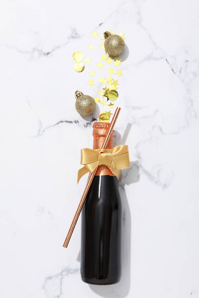 The concept of celebrating the New Year 2024, bottles with decorations - Photo, Image