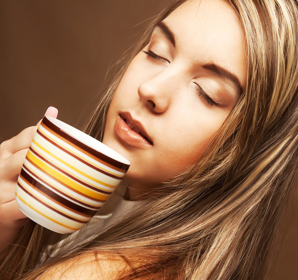 Beautiful woman drinking coffee - Photo, Image