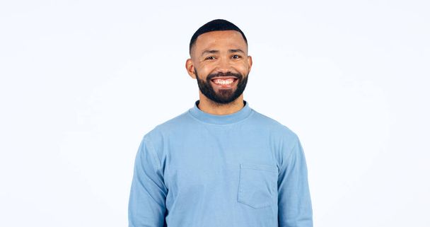 Happy, portrait and man in Brazil, studio and white background and confidence and pride in fashion. Face, smile and person with happiness, optimism and positive mindset with style in mockup space. - Fotó, kép