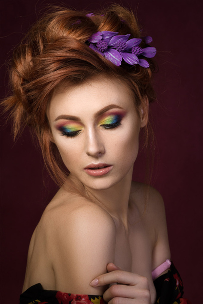 Portrait of beautiful redhaired woman with colourful creative ma - Fotó, kép