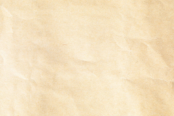 Коричневий папір з зернистою макротекстурою - Фото, зображення