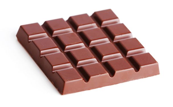 Black chocolate bar isolated on white - 写真・画像