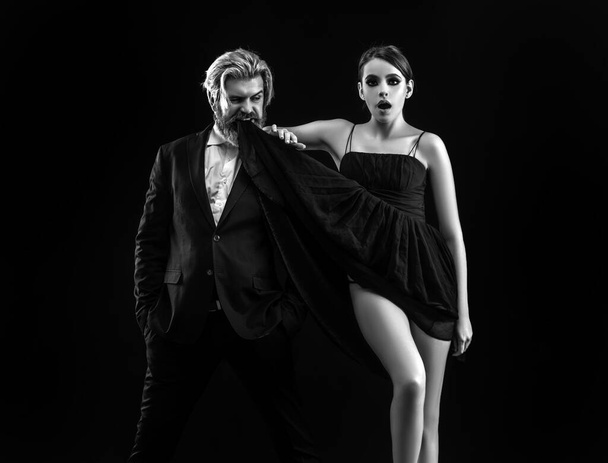 Man in a black suit. Elegant couple love. Luxurious passionate love concept - Zdjęcie, obraz