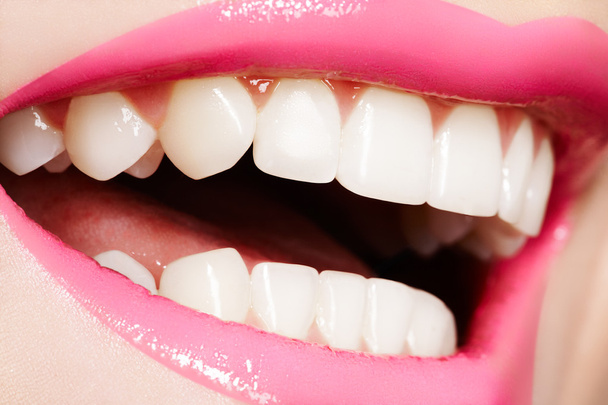 Macro happy woman's smile with healthy white teeth, bright gloss lips - Fotografie, Obrázek