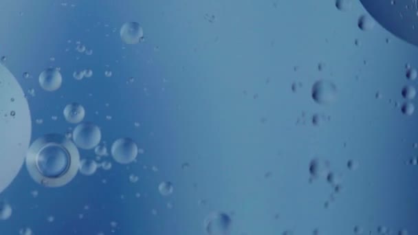Масляна бульбашка, що рухається на концепції води мінімальний фон, масляні фарби з бульбашками
 - Кадри, відео
