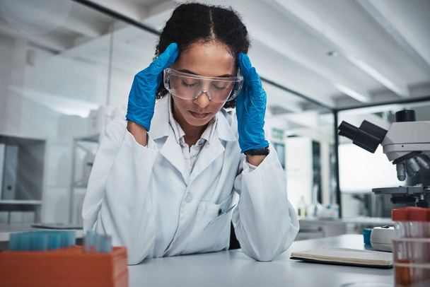 Stress, woman or scientist with headache in a laboratory suffering from burnout, migraine pain or overworked. Exhausted, frustrated or tired worker working on science research with fatigue or tension. - Photo, Image