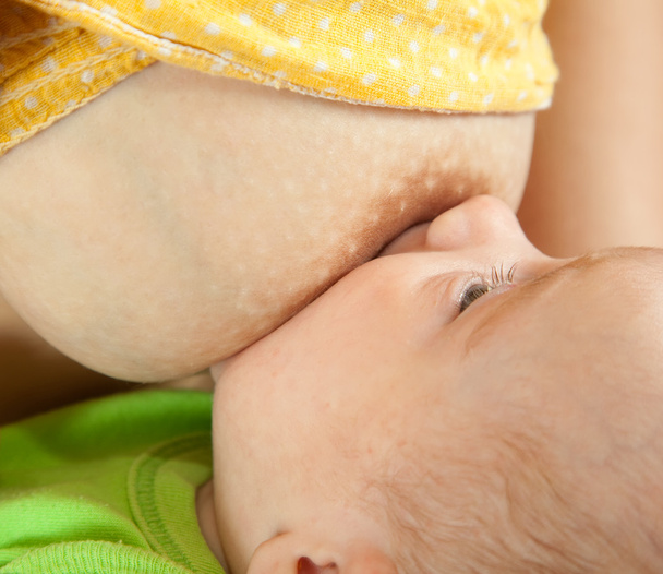 Little baby breast feeding - Fotó, kép