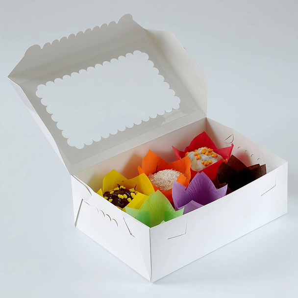 Box with tulip forms, confectionery object isolated over white background - Photo, Image
