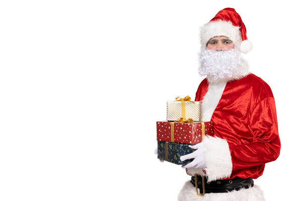 PNG, Joulupukki lahjoja käsissä, eristetty valkoisella taustalla. - Valokuva, kuva