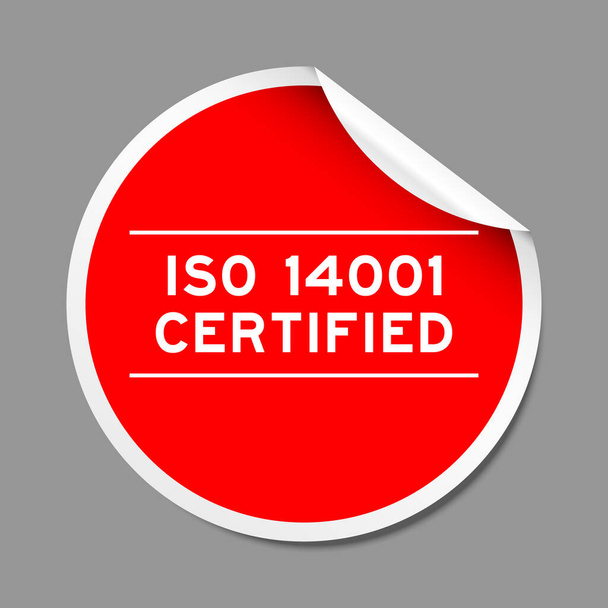 Наклейка красного цвета со словом ISO 14001 сертифицирована на сером фоне - Вектор,изображение