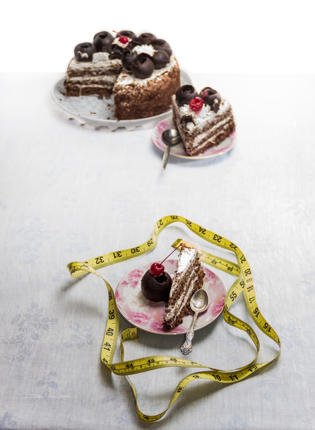 Ruban à mesurer et gâteau
 - Photo, image