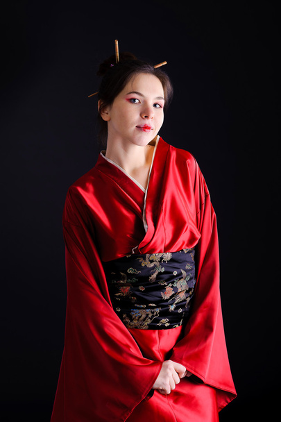 The girl in native costume of japanese geisha - 写真・画像