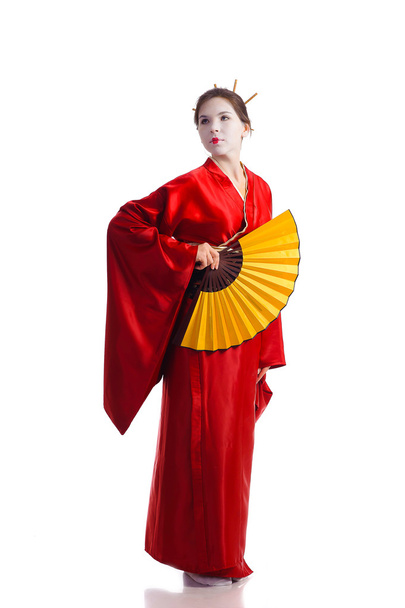The girl in native costume of japanese geisha - Fotó, kép