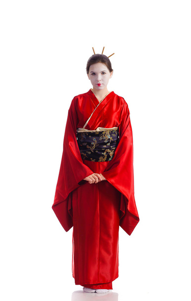 The girl in native costume of japanese geisha - Фото, изображение