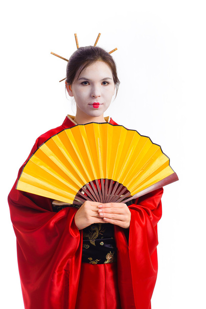 The girl in native costume of japanese geisha - Foto, afbeelding