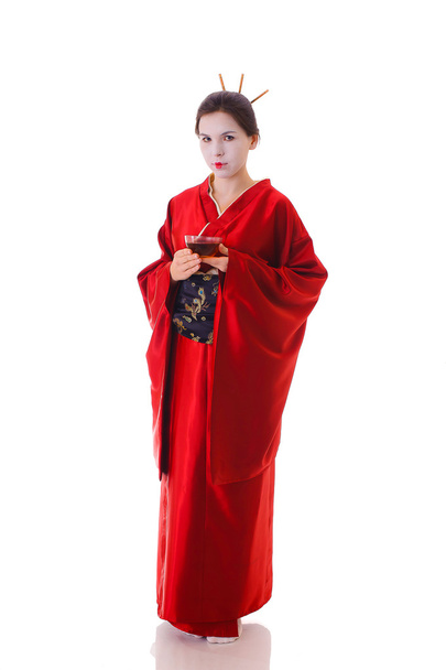 The girl in native costume of japanese geisha - Photo, image