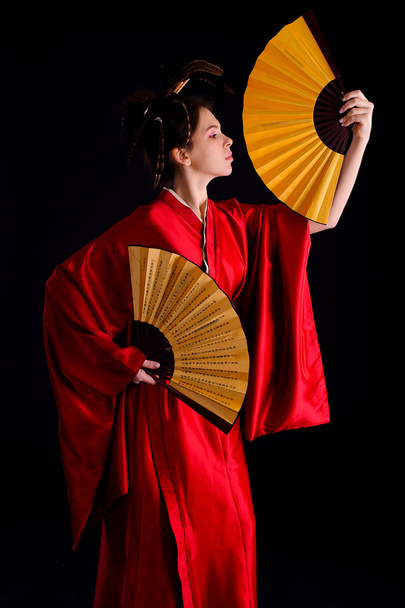 The girl in native costume of japanese geisha - Photo, Image