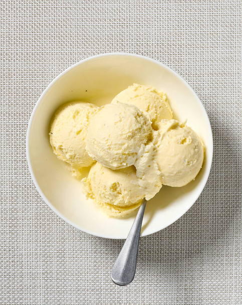 bowl of vanilla ice cream, top view - Photo, Image