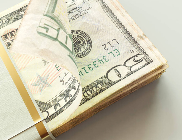 Um maço de notas de Dólar Americano num fundo de luz isolado - renderização 3D - Foto, Imagem