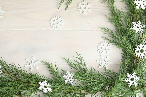 white wooden winter background with christmas decorations and copy space - Photo, Image