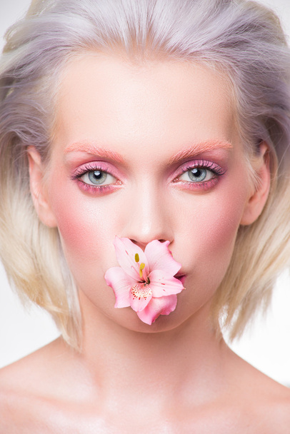 Blonde girl with flower - Fotografie, Obrázek