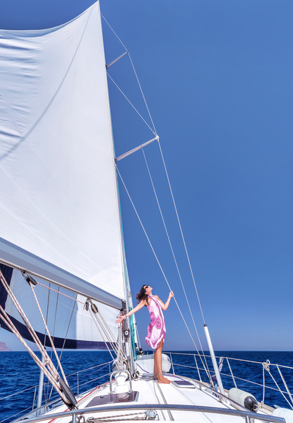 Happy woman on sailboat - Photo, Image