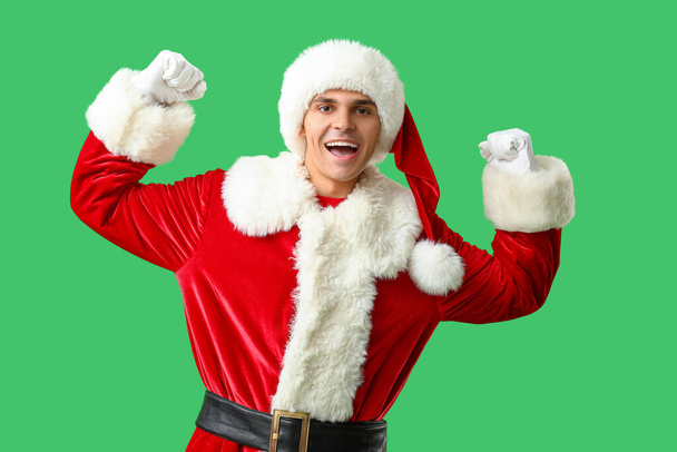 Happy Santa Claus on green background - Photo, Image