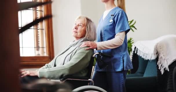 Assisted living, nurse and a senior woman in a wheelchair for healthcare, trust or care at a retirement home. Medical, wellness and caregiver helping an elderly patient with a disability in recovery. - Footage, Video