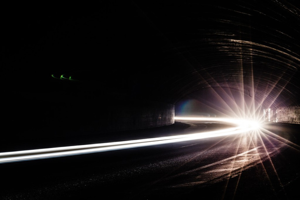 light trails in tunnel. Art image. Long exposure photo taken in  - Photo, Image