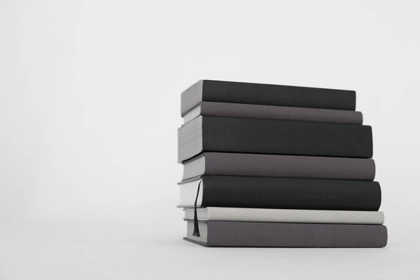stack of books on a black background. 3 d render. - Photo, Image