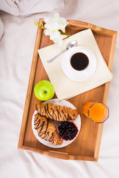Breakfast in bed on wood tray - Photo, Image