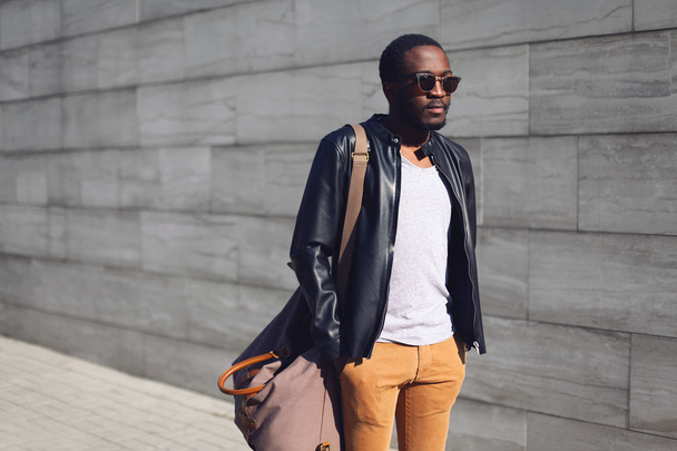 Street fashion concept - stylish handsome african man standing i - Фото, изображение