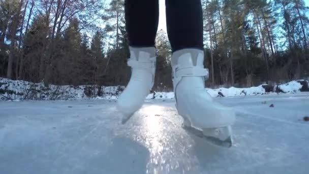 Ice skating on frozen pond - Footage, Video