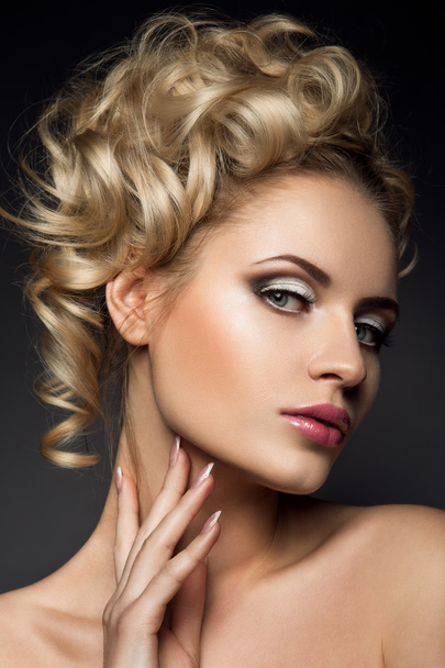 Glamour portrait of beautiful woman model with fresh daily makeup and romantic wavy hairstyle. - Photo, Image