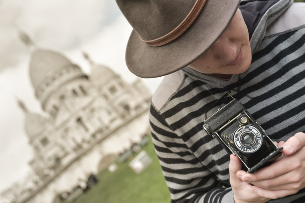 France, Paris, young man taking photograph, Sacre Coeur in backg - Photo, Image