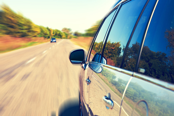Blurred road and car, speed motion background - Фото, зображення