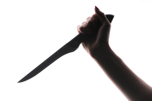 hand with knife - Foto, afbeelding