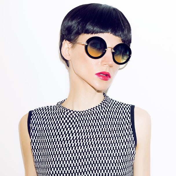Girl in fashion sunglasses and trendy short haircut. - Photo, Image
