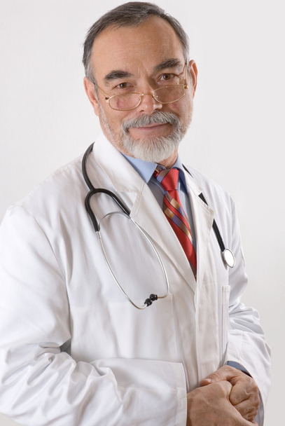 Caring doctor smiling - Photo, Image