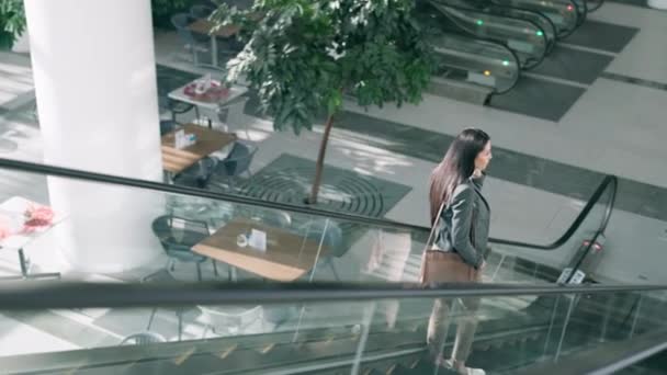 Escalator, commute and business woman in office for travel, leaving or arrival at work. Corporate worker, professional airport and female person for career, job and journey in modern workplace. - Footage, Video