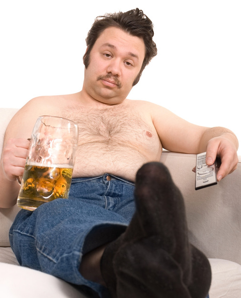 Overweight man with a beer glass - Photo, image
