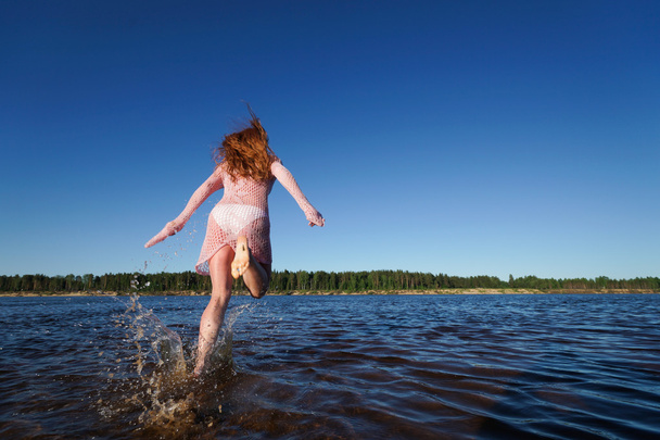 Girl run to the river - Фото, зображення