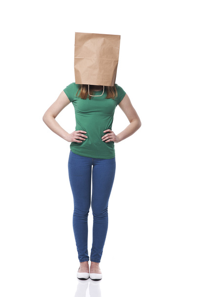 Female ecologist with paper bag on head - 写真・画像