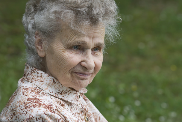 Elderly woman thinking - Фото, изображение