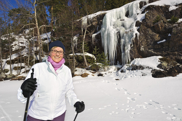 smiling woman cross country skiing  - Photo, Image