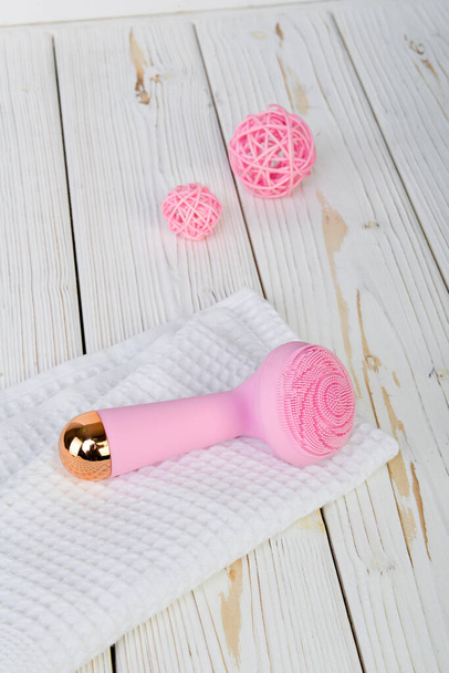 Vibrating facial cleanser and massager - Photo, Image