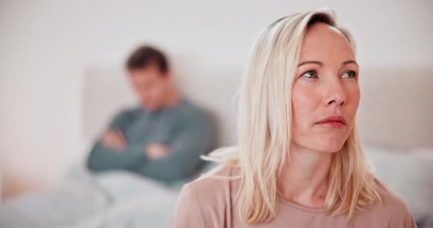 Woman, thinking and conflict of couple in bedroom with stress, breakup or toxic relationship at home. Face of frustrated partner in crisis, divorce and fight for cheating, affair or trauma of mistake. - Footage, Video