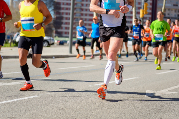 Marathon running race, runners feet on road - Foto, Imagem