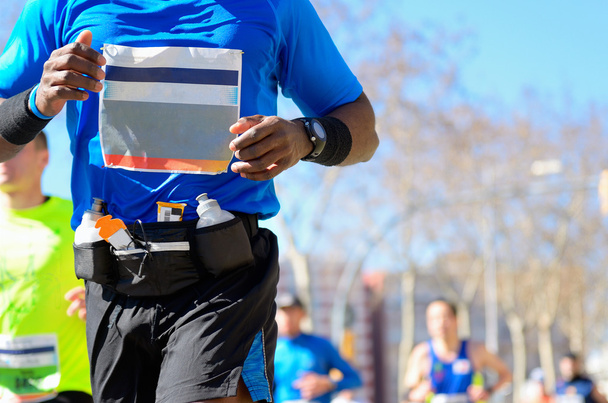 Marathon running race, black runner on road - Foto, immagini